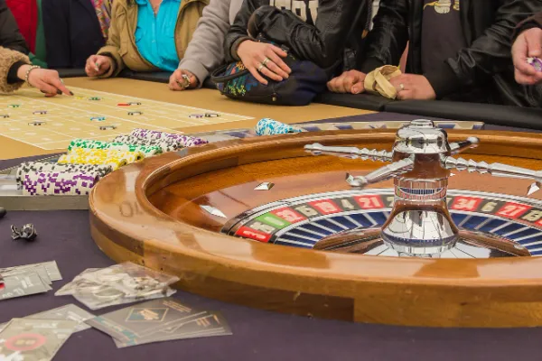 people playing roulette in casino